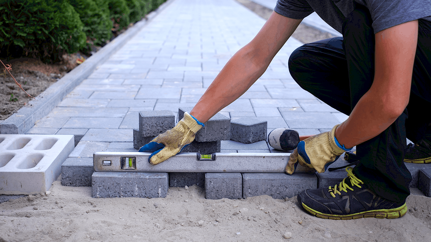 Local bricklayer building a garden path- request a quote