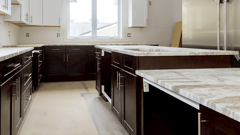 Kitchen fitter installing modern kitchen units - request a quote
