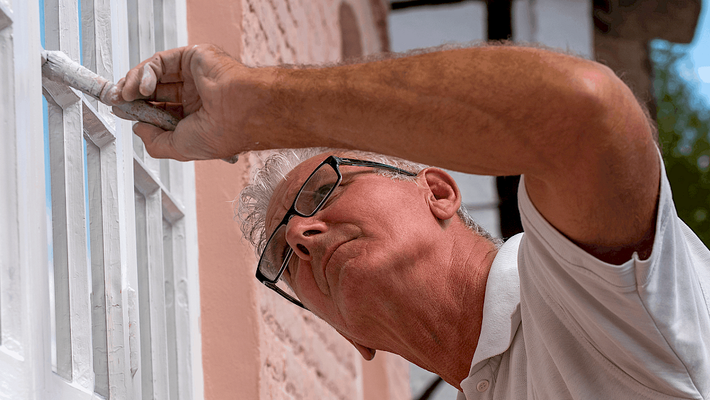 Exterior house painting by professional decorator - request a quote